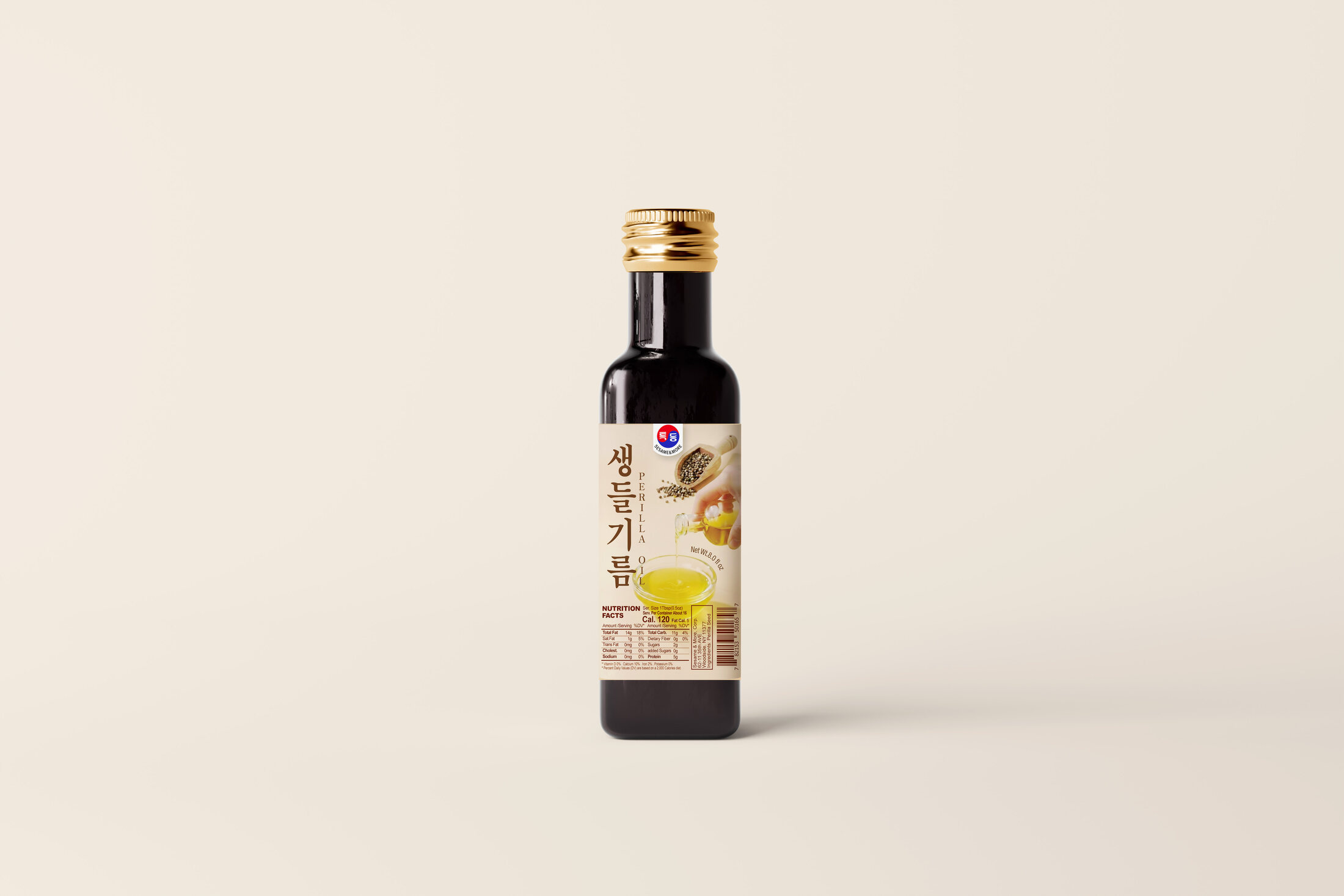 Perilla oil bottle photographed on a warm neutral background with generous negative space
